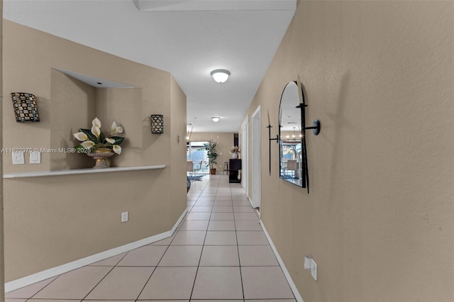 16101 SW 104th Ter, Miami, FL 33196 - hall with light tile patterned floors and baseboards