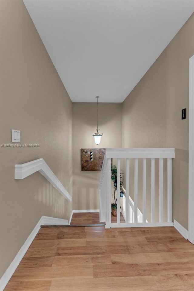 16101 SW 104th Ter, Miami, FL 33196 - stairs with wood finished floors and baseboards
