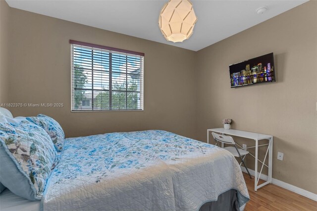 16101 SW 104th Ter, Miami, FL 33196 - bedroom with wood finished floors and baseboards