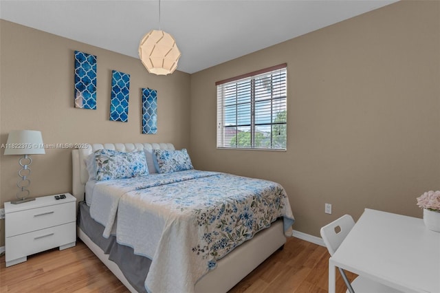 16101 SW 104th Ter, Miami, FL 33196 - bedroom with light wood-type flooring and baseboards