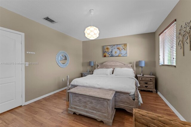 16101 SW 104th Ter, Miami, FL 33196 - bedroom with light wood-type flooring and baseboards