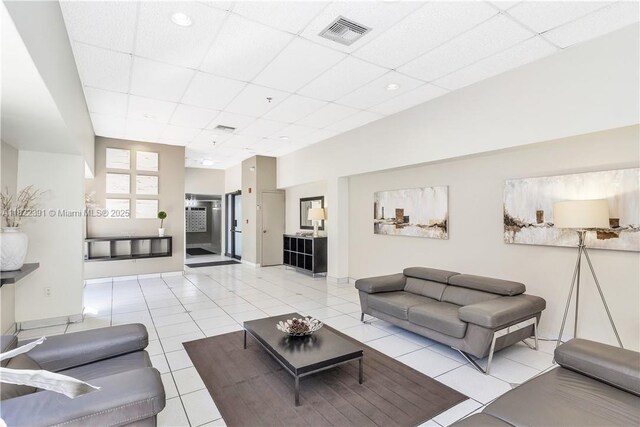 17600 N Bay Rd Unit N508, Sunny Isles Beach, FL 33160 - living area with a drop ceiling and light tile patterned floors