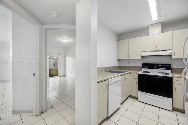 8421 SW 209th St Unit 8421, Cutler Bay, FL 33189 - kitchen with electric range oven, white dishwasher, under cabinet range hood, light countertops, and light tile patterned floors
