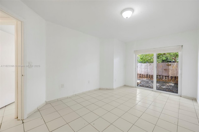 8421 SW 209th St Unit 8421, Cutler Bay, FL 33189 - spare room featuring baseboards
