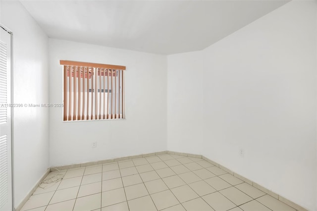 8421 SW 209th St Unit 8421, Cutler Bay, FL 33189 - spare room featuring baseboards