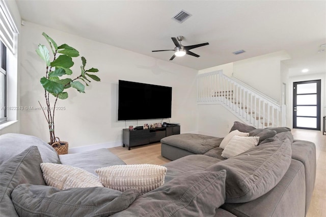 10129 W 32nd Ln, Hialeah, FL 33018 - living room with stairs, light wood finished floors, ceiling fan, and recessed lighting