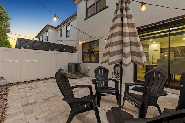 10129 W 32nd Ln, Hialeah, FL 33018 - patio terrace at dusk featuring a patio