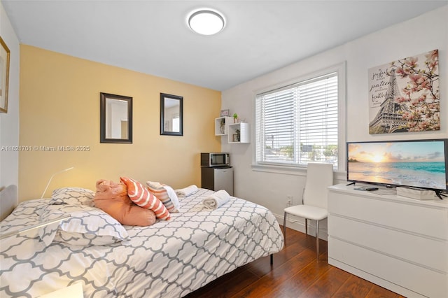 18401 SW 115th Ave, Miami, FL 33157 - bedroom with dark wood-style flooring and baseboards