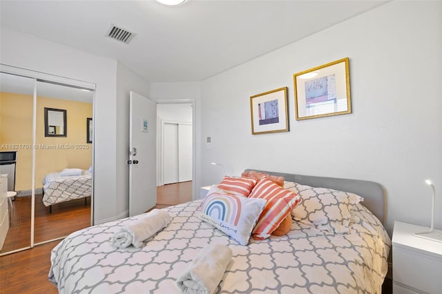 18401 SW 115th Ave, Miami, FL 33157 - bedroom with dark wood-style flooring