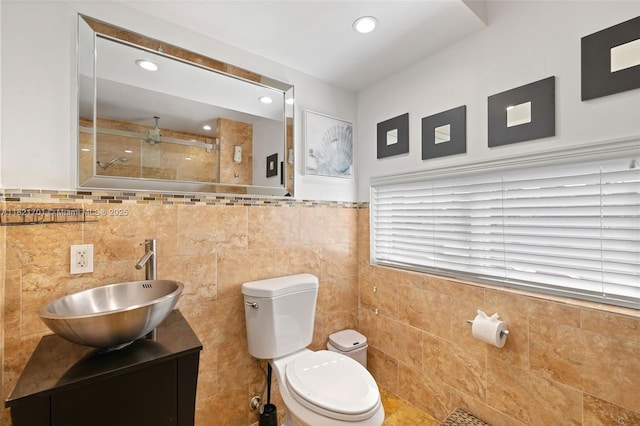 18401 SW 115th Ave, Miami, FL 33157 - full bathroom featuring tile walls, vanity, a tile shower, recessed lighting, and a wainscoted wall