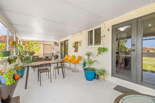 18401 SW 115th Ave, Miami, FL 33157 - sunroom / solarium with french doors, concrete flooring, healthy amount of natural light, and outdoor dining space