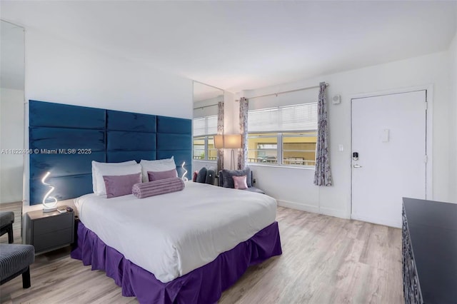 4015 Indian Creek Dr Unit 106, Miami Beach, FL 33140 - bedroom featuring wood finished floors