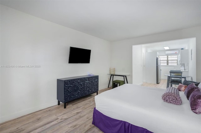 4015 Indian Creek Dr Unit 106, Miami Beach, FL 33140 - bedroom featuring light wood-style floors and baseboards