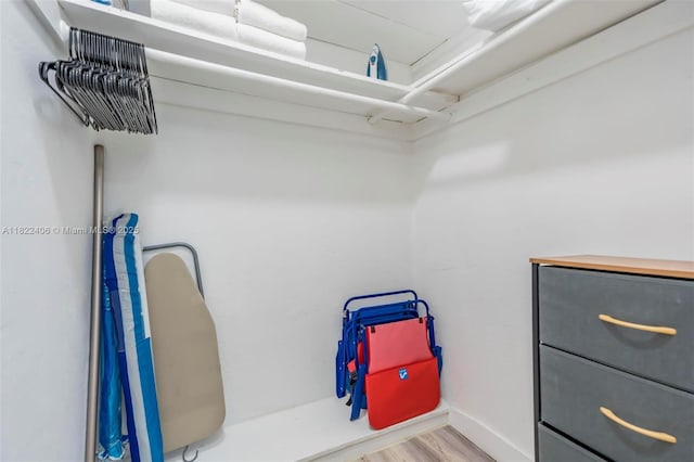 4015 Indian Creek Dr Unit 106, Miami Beach, FL 33140 - walk in closet with wood finished floors