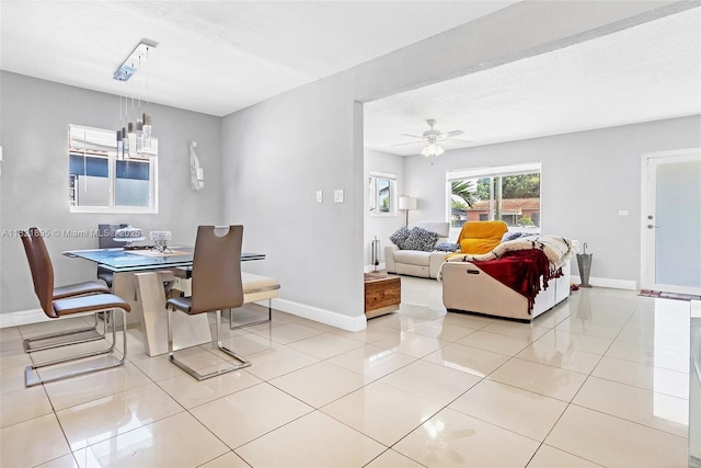 3430 NW 16th St, Miami, FL 33125 - dining space featuring a ceiling fan and light tile patterned floors