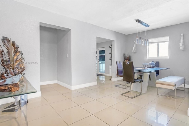 3430 NW 16th St, Miami, FL 33125 - dining area with baseboards and light tile patterned floors