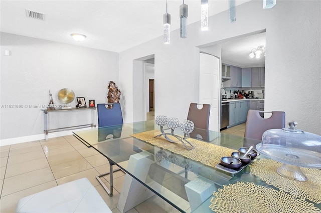 3430 NW 16th St, Miami, FL 33125 - dining space with light tile patterned floors