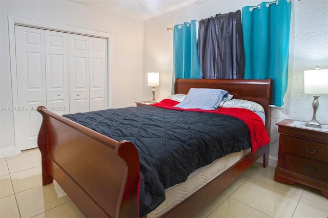 3430 NW 16th St, Miami, FL 33125 - bedroom featuring tile patterned floors and a closet