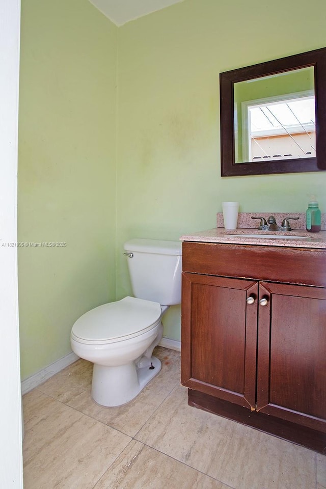 3430 NW 16th St, Miami, FL 33125 - bathroom with vanity and tile patterned flooring