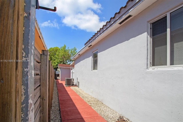 3430 NW 16th St, Miami, FL 33125 - view of property exterior with stucco siding and a tiled roof