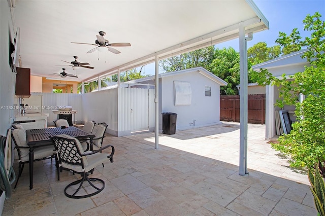 3430 NW 16th St, Miami, FL 33125 - view of patio featuring ceiling fan and outdoor dining area
