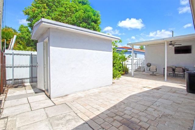 3430 NW 16th St, Miami, FL 33125 - view of patio with ceiling fan and a shed