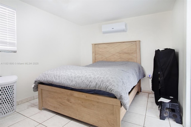 3430 NW 16th St, Miami, FL 33125 - bedroom with a wall mounted AC and light tile patterned floors