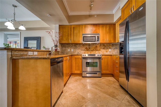 1755 E Hallandale Beach Blvd Unit 608E, Hallandale Beach, FL 33009 - kitchen with stainless steel appliances, crown molding, brown cabinetry, tasteful backsplash, and dark stone counters