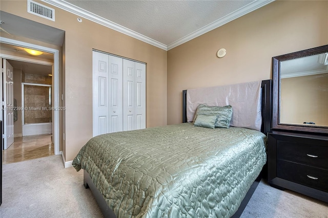 1755 E Hallandale Beach Blvd Unit 608E, Hallandale Beach, FL 33009 - carpeted bedroom with ornamental molding, a closet, and a textured ceiling