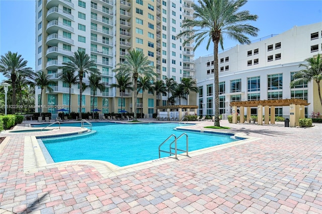 1755 E Hallandale Beach Blvd Unit 608E, Hallandale Beach, FL 33009 - community pool featuring a patio area