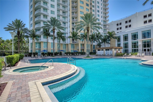 1755 E Hallandale Beach Blvd Unit 608E, Hallandale Beach, FL 33009 - community pool with a community hot tub and a patio area