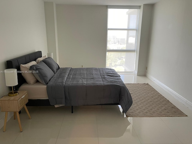 20335 W Country Club Dr Unit 1701, Aventura, FL 33180 - bedroom featuring multiple windows and tile patterned floors
