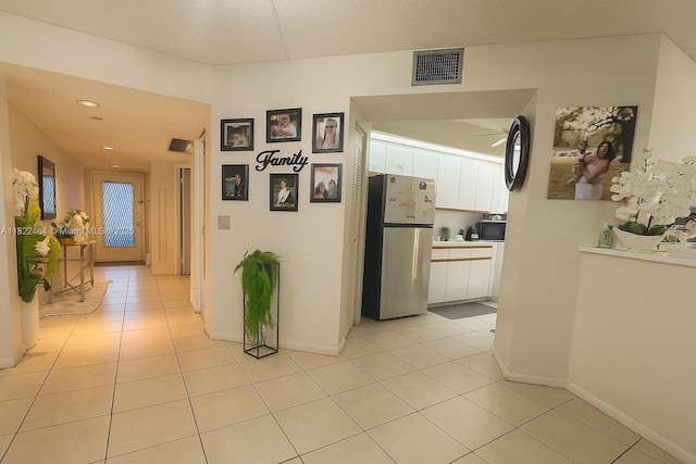 12500 SW 5th Ct Unit 112M, Pembroke Pines, FL 33027 - corridor with light tile patterned floors and recessed lighting