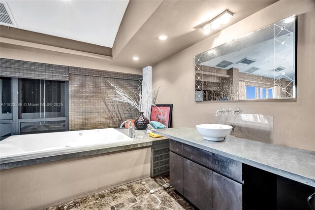 780 NE 69th St Unit T-1A, Miami, FL 33138 - full bathroom featuring vanity, a garden tub, and recessed lighting