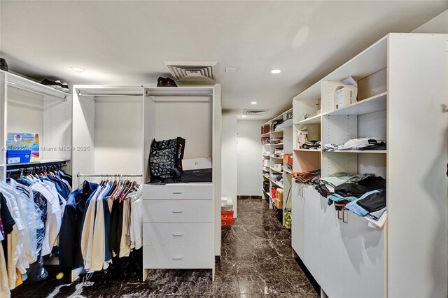 780 NE 69th St Unit T-1A, Miami, FL 33138 - spacious closet with dark marble finish floors
