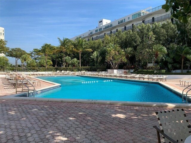 780 NE 69th St Unit T-1A, Miami, FL 33138 - community pool with a patio area