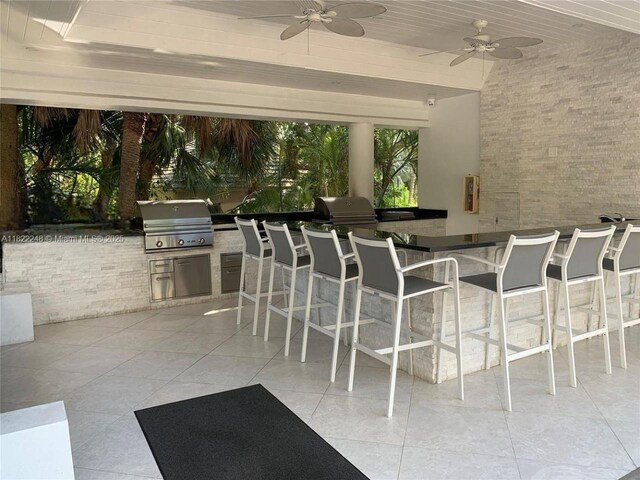 780 NE 69th St Unit T-1A, Miami, FL 33138 - view of patio / terrace with exterior kitchen and a ceiling fan
