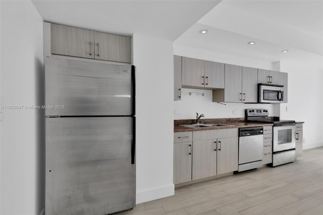 111 E Flagler St Unit 902, Miami, FL 33131 - kitchen with stainless steel appliances, recessed lighting, and light wood finished floors