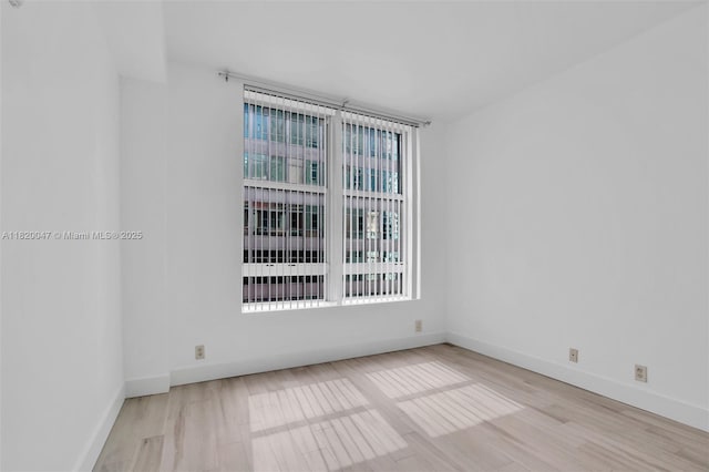 111 E Flagler St Unit 902, Miami, FL 33131 - empty room with wood finished floors
