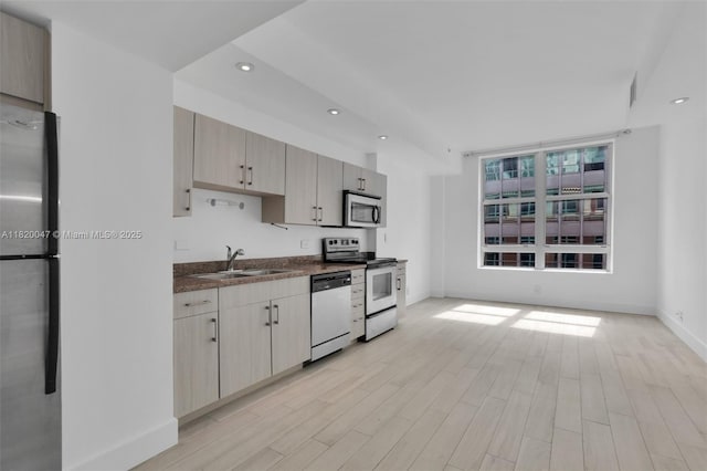 111 E Flagler St Unit 902, Miami, FL 33131 - kitchen featuring stainless steel appliances, recessed lighting, and light wood finished floors