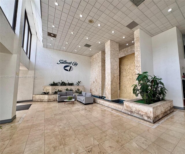 13499 Biscayne Blvd Unit 703, North Miami, FL 33181 - lobby featuring a high ceiling and recessed lighting