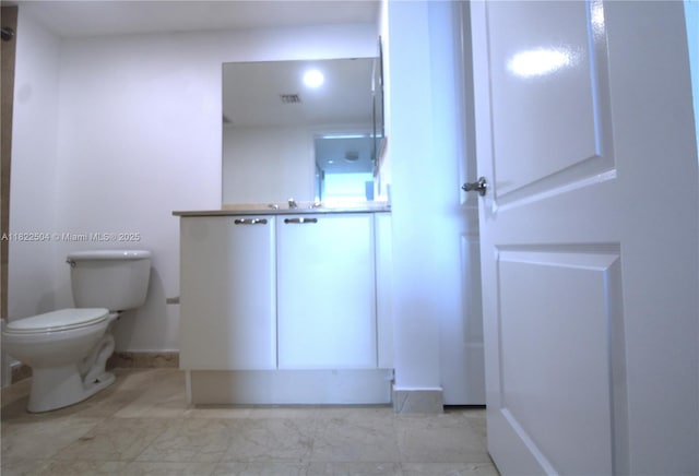 2101 Brickell Ave Unit 1711, Miami, FL 33129 - bathroom with toilet and marble finish flooring