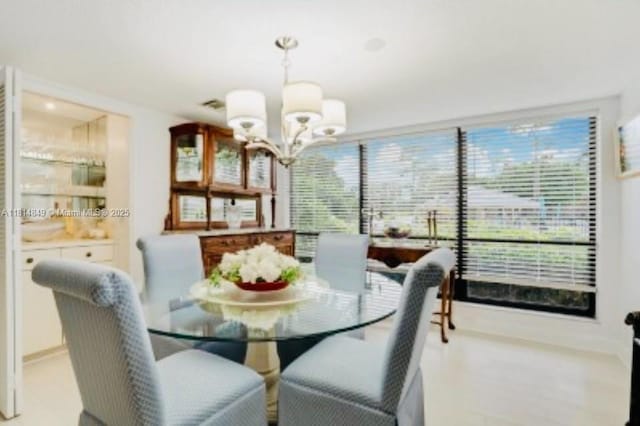 4650 Kittiwake Ct Unit 4650, Boynton Beach, FL 33436 - dining area with a chandelier and healthy amount of natural light