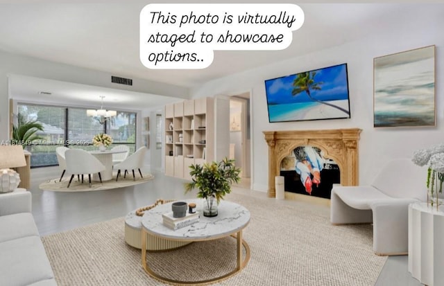 4650 Kittiwake Ct Unit 4650, Boynton Beach, FL 33436 - living area featuring a chandelier and a fireplace