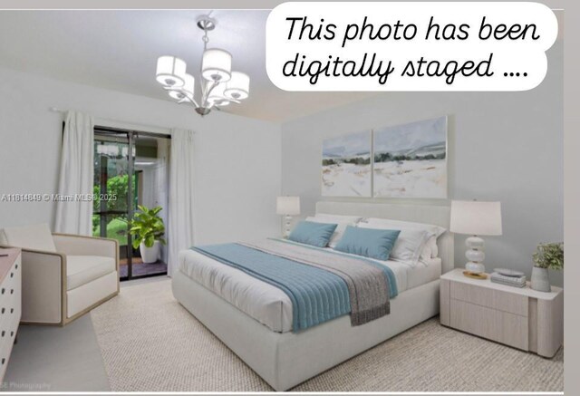 4650 Kittiwake Ct Unit 4650, Boynton Beach, FL 33436 - bedroom featuring a chandelier and access to exterior