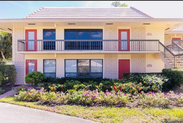 4650 Kittiwake Ct Unit 4650, Boynton Beach, FL 33436 - view of front facade featuring stairway