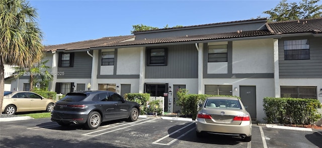 9750 NW 14th St Unit 30-5, Coral Springs, FL 33071 - view of building exterior with uncovered parking