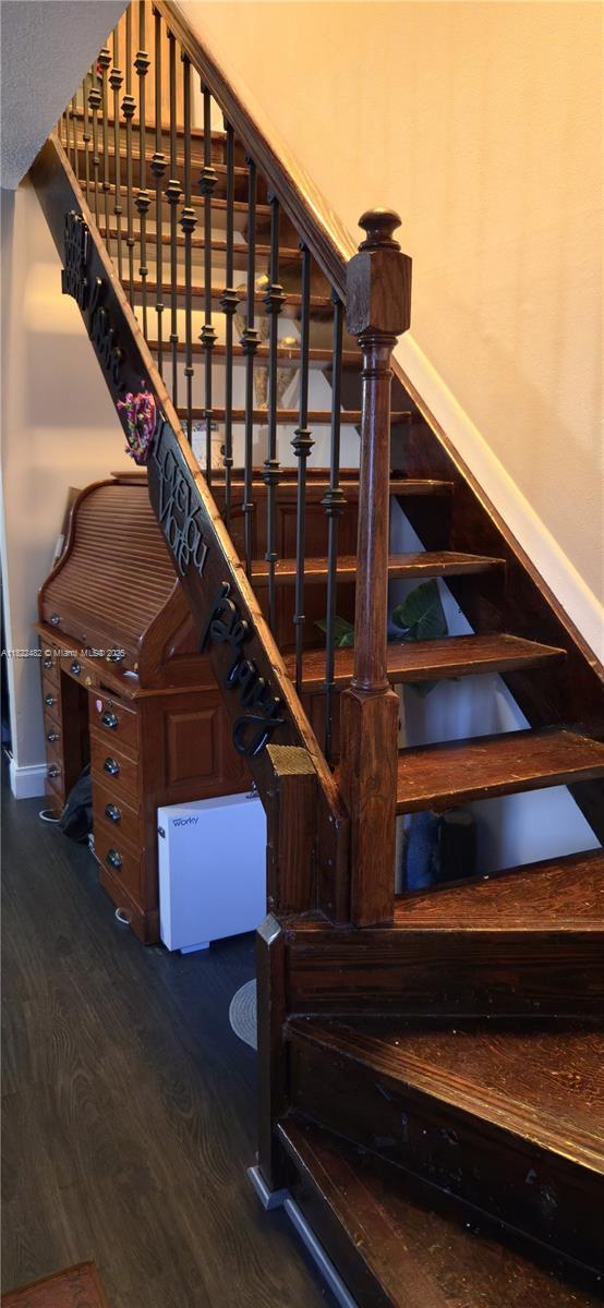 9750 NW 14th St Unit 30-5, Coral Springs, FL 33071 - staircase featuring wood finished floors