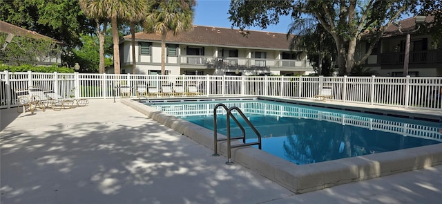 9750 NW 14th St Unit 30-5, Coral Springs, FL 33071 - community pool with a patio area