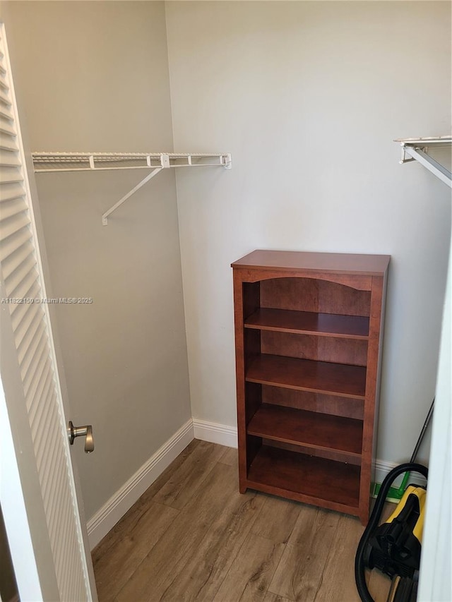 3150 W Rolling Hills Cir Unit 310, Davie, FL 33328 - spacious closet featuring wood finished floors
